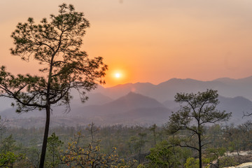 Northern Thailand During the Burning Season causes a beautiful sunset