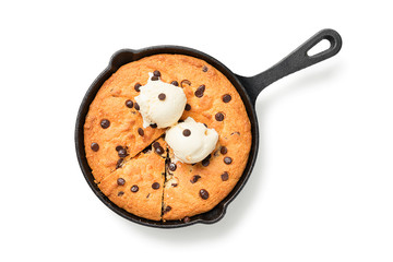 Giant skillet cookie with chocolate chips served with ice cream. isolated on white background