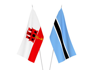 National fabric flags of Gibraltar and Botswana isolated on white background. 3d rendering illustration.