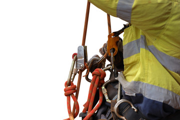 Rope access industry abseiler worker working at height abseiling resting by hanging on fall safety body chest harness safety secondary ascender device with isolated white background    - obrazy, fototapety, plakaty