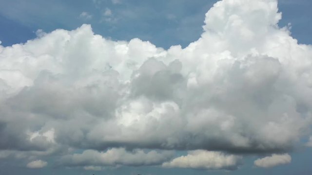 Aerial hyperlapse of storm clouds in sky 