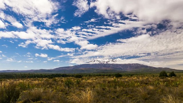 4k time lapse of clouds passing over the beautiful landscapeof New Zealand’s Tongariro National Park with Mount Ruapehu in the background