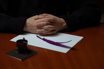 Writer  hands and writing instrument