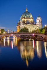 The Cathedral of Berlin with the river Spree at night