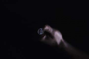 Volatility of the national currency. Russian coins with the inscription "ruble". Low ruble exchange rate. Fall of course. Financial crisis. Ruble in the hand.