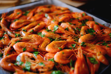 Fresh boiled prawns with coriander. A delicious dish of seafood.