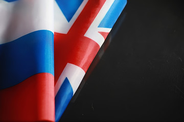 The concept of diplomatic relations. Flag of the United States of America and the Russian...