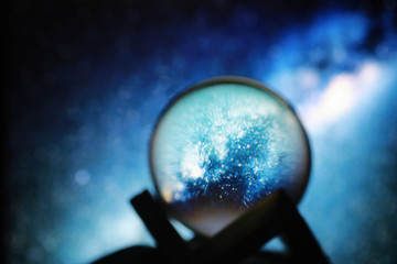 Astrological background. Crystal ball with predictions. Horoscope of the stars. Fortune telling and...