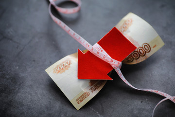 Business concept. The depreciation of the national currency. Bill with the inscription 