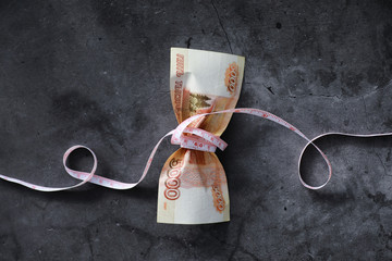 Business concept. The depreciation of the national currency. Bill with the inscription 