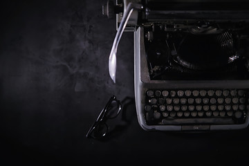 Vintage journalist tool. Typewriter retro. The writer is at work. Seal of the novel. Journalist...