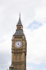 Fototapeta na wymiar London, United Kingdom 9-8-2017 - Isolated photo of big ben clock tower in London. Tourist attraction photo, cloudy and rainy weather