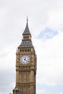 London, United Kingdom 9-8-2017 - Isolated photo of big ben clock tower in London. Tourist attraction photo, cloudy and rainy weather