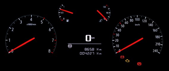 Car dashboard panel with speedometer, tachometer, odometer, fuel indicator, water temperature gauge, check engine and battery warning icon. Illuminated analog instrument cluster with digital display.