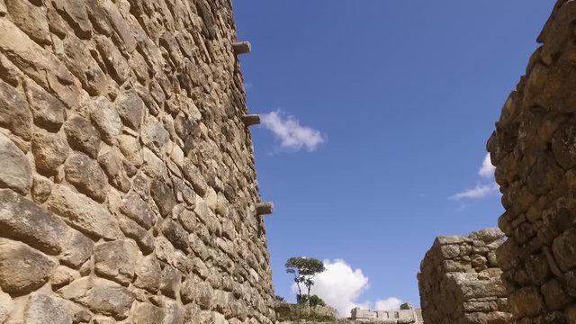 Stone walls and mountains in sacred plaza, Machu Picchu, Cusco, Peru