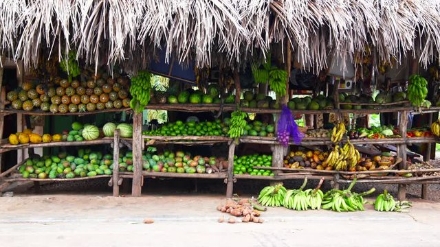 Fruits and vegetables shop on tropical marketplace on the street,Samana peninsula,Dominican republic.
