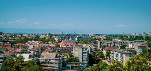 Panoramic city view of Plovdiv, Bulgaria with apartment buildings and blue skies