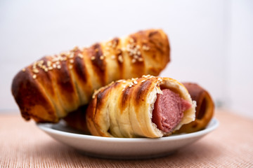 sausages in a dough on a plate