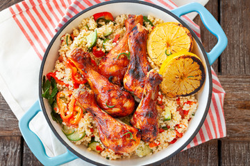 Marinierte Huehnerschenkel mit Couscous