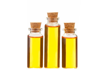 Essence of flowers on white background in beautiful glass Bottle