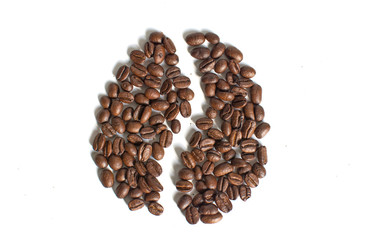 A close up top view of a coffee bean piled on a white background