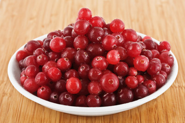 fresh cranberries on a plate