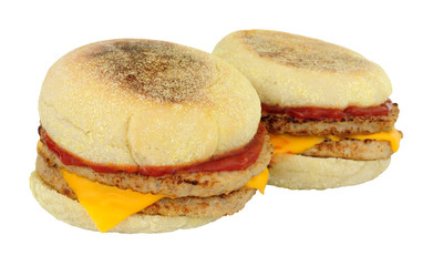 Sausage burger and cheese sandwiches in English muffins isolated on a white background