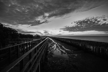 Black and white photography of a beach wooden pier,Black and white photography of the Bridge in Burgas, Added Noise