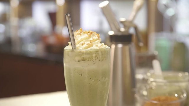 drink with cream and flakes with straw - slide left