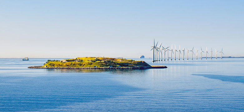 Island Middelgrundsfortet and offshore wind turbines on the coast of Copenhagen in Denmark