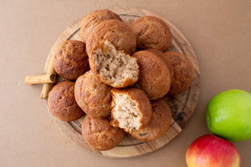Apple Cinnamon Muffins with apples and cinnamon sticks