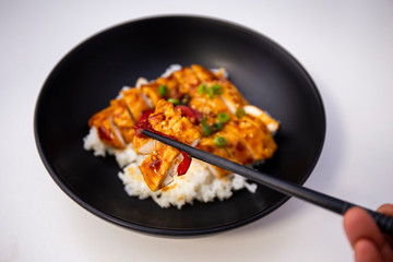 Rice covered by Teriyaki Chicken