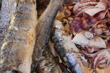 roasted fish cooked on the grill on a barbecue