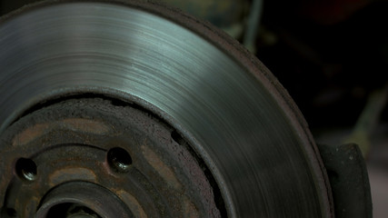 Close up car wheel hub. Detailed brake disk.