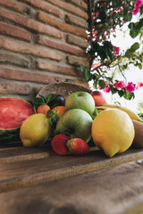 fruits on top of a wooden table