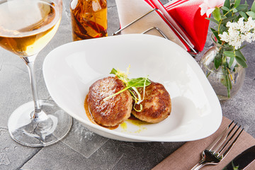 Fish cutlets in restaurant serving