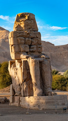 The Colossi of Memnon, two stone massive statues of the Pharaoh Amenhotep III, who reigned in Egypt during the Dynasty XVIII.