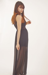 Fototapeta premium Full length view of young model with brown hair