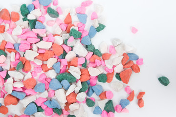 Pastel stones,Pink, Red, Blue, Blue sky, Green, White. Gravel texture. Gravel background. Stones texture,Road gravel texture. Gravel background. Stones texture. Stones for plants. 
