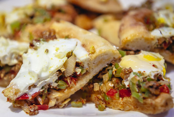 Close up on a slices of Chinese pizza in restaurant in Beijing, China