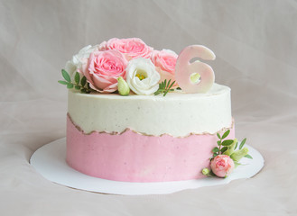 pink birthday cake with roses