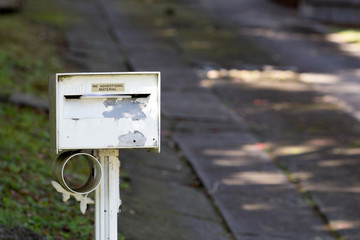  mailbox no number in front of the house with sunlight and beautiful natural background
