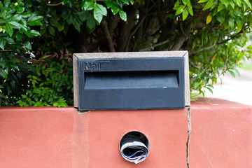  mailbox no number in front of the house with sunlight and beautiful natural background