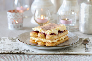 Traditional italian tiramisu cake on the table.
