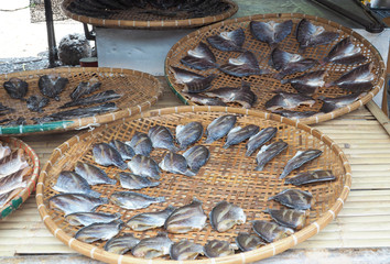 Dried fish by the sun at local market Thailand. 