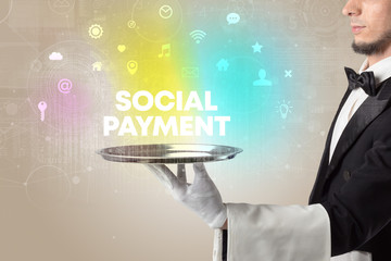 Waiter serving social networking with SOCIAL PAYMENT inscription, new media concept