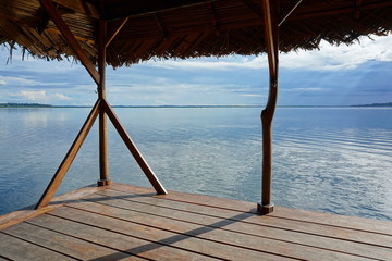 Peaceful seascape from a tropical hut over the water, Bocas del Toro, Central America, Panama