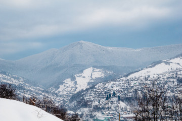 Winter mountains background with trees and snow. Winter landscape