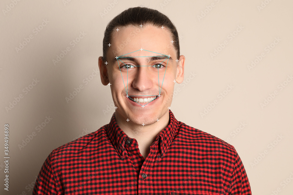 Poster facial recognition system. man with and digital biometric grid on light background