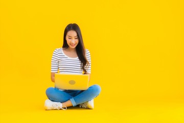 Portrait beautiful young asian woman use laptop